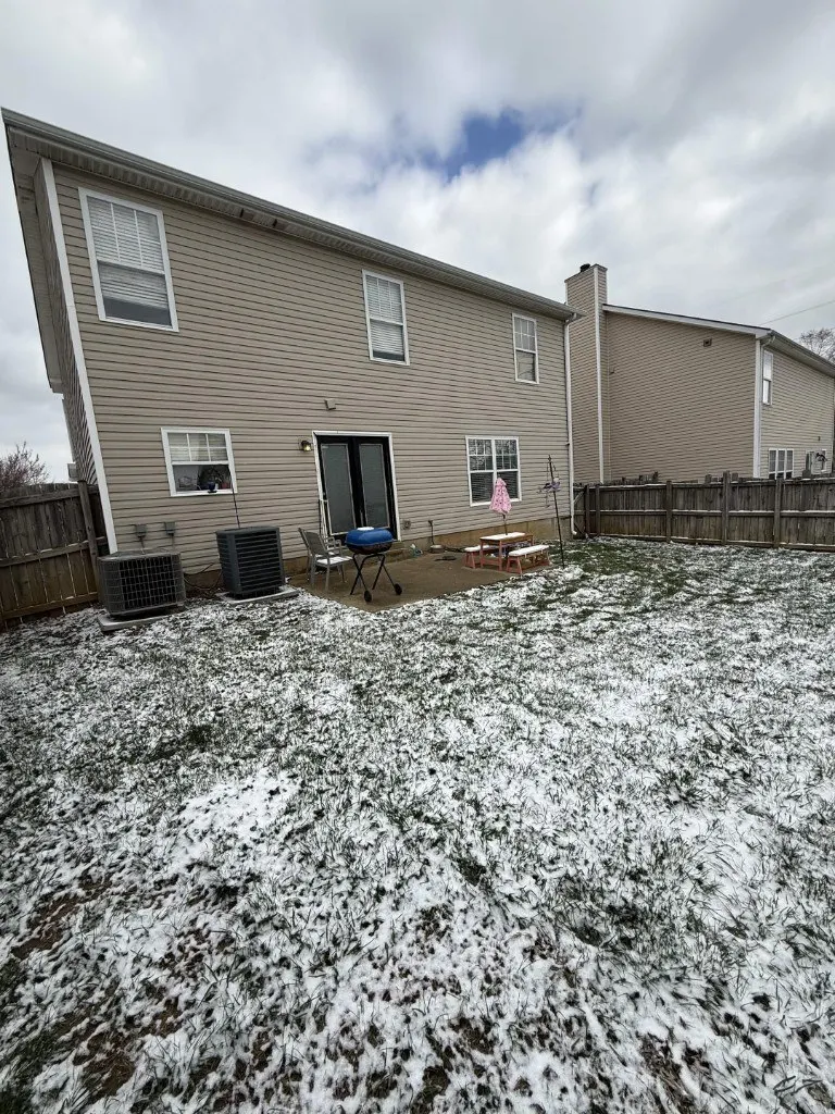 Before photo: backyard prior to custom deck and pergola installation in Lexington KY