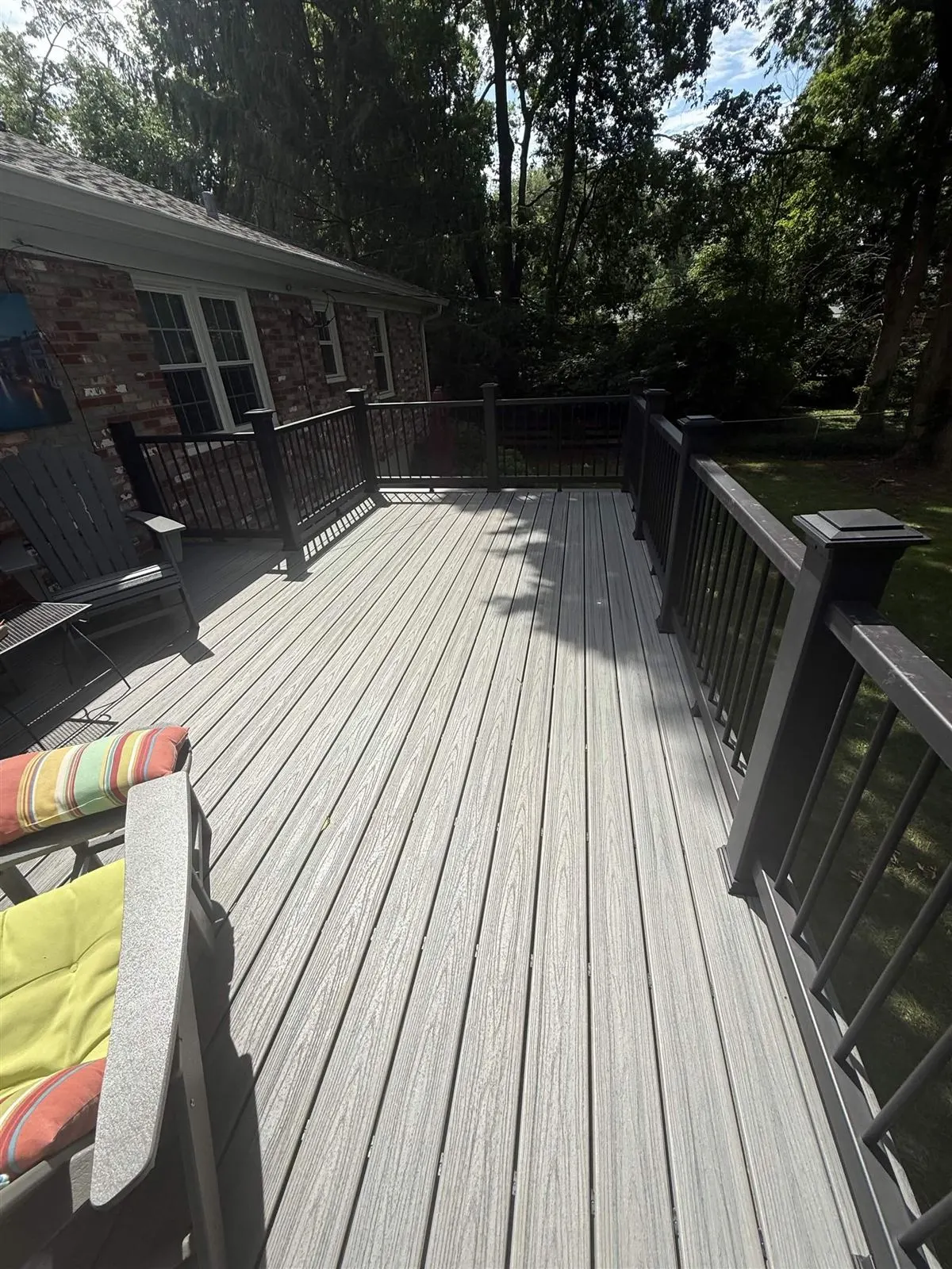 Gray composite deck with dark bronze railing built by Big Blue Fence & Deck in Lexington KY